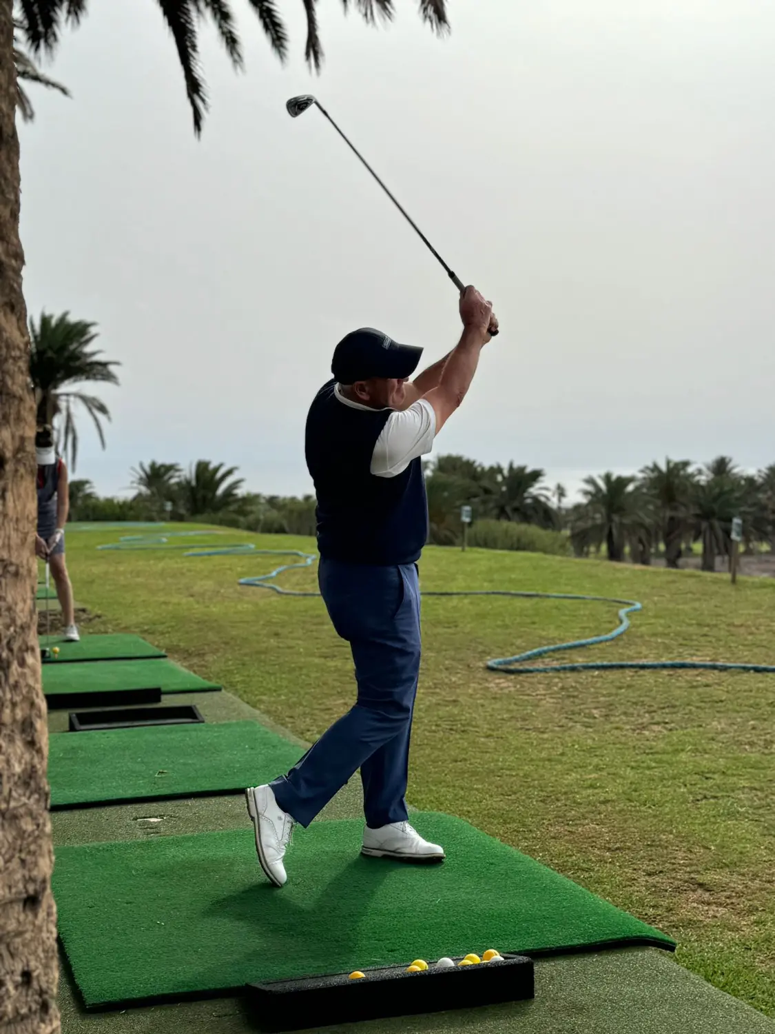 A man playing golf at Kelly Golf