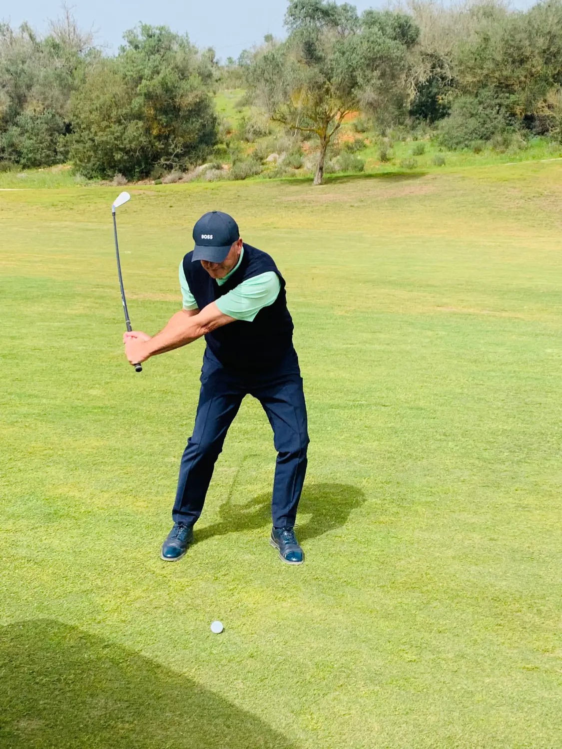 A man playing golf at Kelly Golf