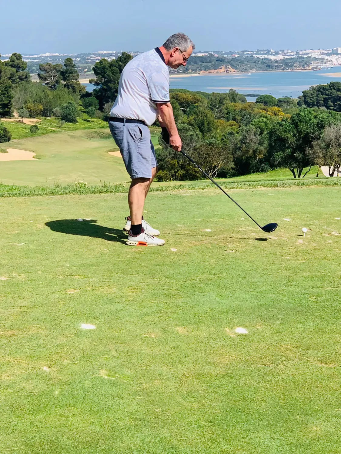 A man playing golf at Kelly Golf